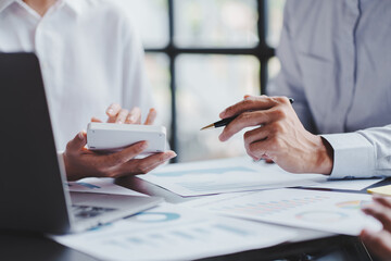 The financiers are calculating personal taxes for their customers.