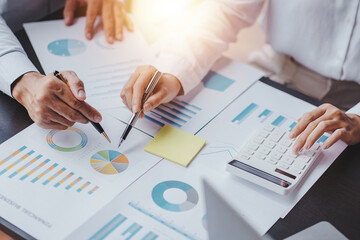 The financiers are calculating personal taxes for their customers.