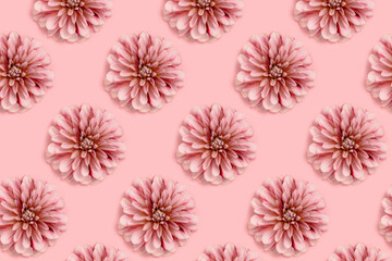 Dahlia flowers pattern on a pink pastel background. Springtime delicate composition.