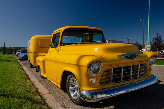 Yellow 1955 Chevrolet pickup truck and matching Boler trailer front view , Drumheller 08/06/2012 canada
