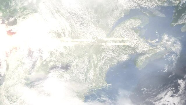 Earth zoom in from outer space to city. Zooming on Granby, Quebec, Canada. The animation continues by zoom out through clouds and atmosphere into space. Images from NASA