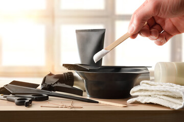 Hair treatment products on wooden table top view