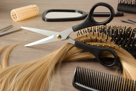 Hair cutting equipment with land detail with hairdressing tools around