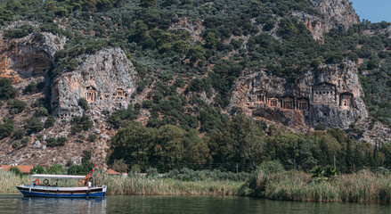The panoramic view of Famous Lycian rock Tombs of ancient Caunos town, Dalyan, Turkey