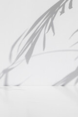 Minimal abstract scene for the presentation of a cosmetic product. Premium podium with a shadow of...