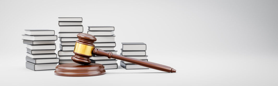 Judge's Gavel and Stacks of Books on Light Gray Background