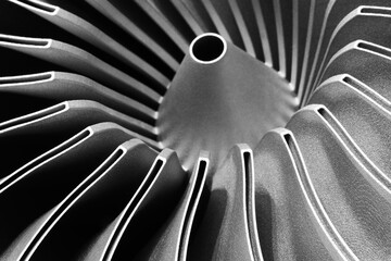Steel blades of turbine propeller 3D printing. Close-up view. Selected focus on foreground,...