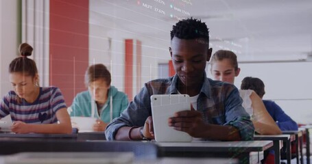 Animation of stock market data processing over african american boy using digital tablet at school - Powered by Adobe
