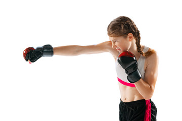 One sportive teen-girl, professional MMA fighter in action, motion isolated on white background. Concept of sport, competition, action, healthy lifestyle.