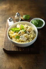 Traditional homemade potato salad with gherkins