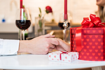 couple holding hands on a celebration