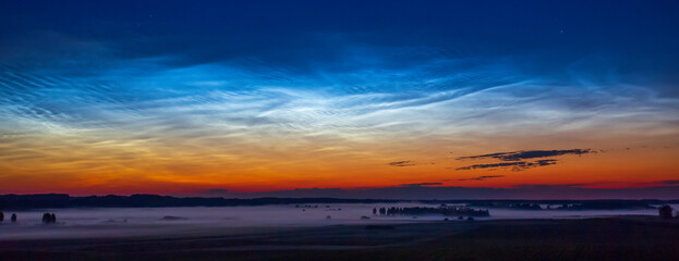 Night shining - Noctilucent clouds at night, panorama