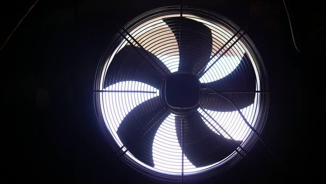 Large production fan for ventilation of the room. 