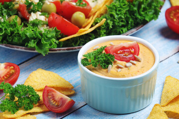 Hummus with vegetables salad and nachos