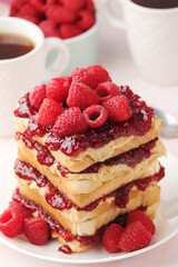 Sandwiches with peanut butter and raspberry jam