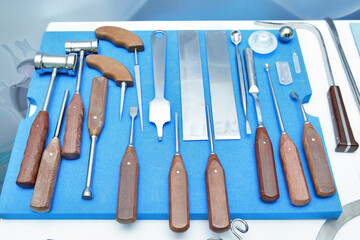 Exhibition of orthopedic instruments. A unique and sophisticated instrument for performing surgical procedures on human joints. Steel tools.