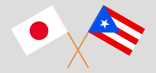 Crossed flags of Japan and Puerto Rico. Official colors. Correct proportion
