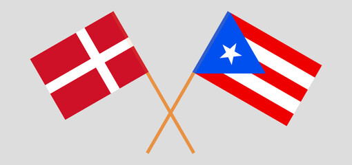Obraz premium Crossed flags of Denmark and Puerto Rico. Official colors. Correct proportion