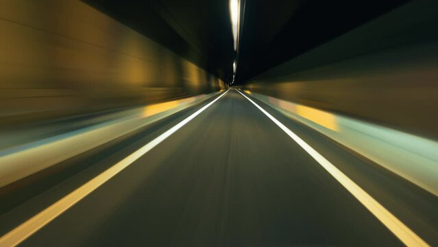 Light trail in tunnel. Driving through tunnel, fish-eye, time-lapse, motion blur
