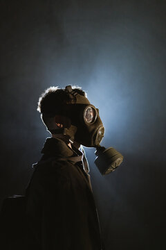 Anonymous man exploring underground tunnel