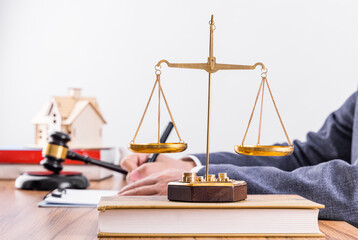 Judges hammer and legal advice figures on the table