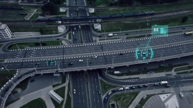 Drone over an urban freeway recognizes and identifies cars. Artificial intelligence-based software tracks vehicle and human movement for speed control, classification, and prediction.