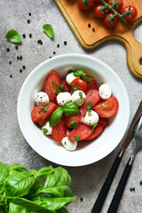 Italian appetizer caprese. Classic caprese salad with tomatoes and mozzarella