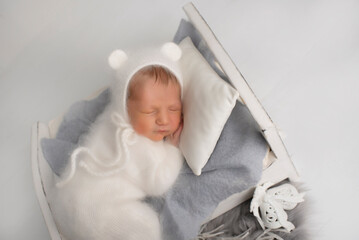 Lovely newborn resting on pillow. sleeping newborn baby boy