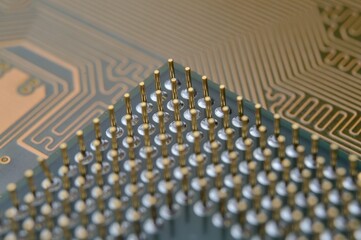 microprocessor on the background of the microcircuit of the motherboard