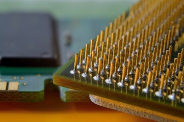 microprocessor on the background of the microcircuit of the motherboard