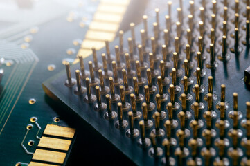 microprocessor on the background of the microcircuit of the motherboard