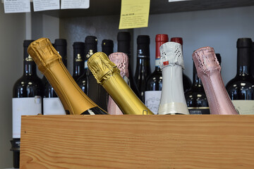 The sparkling wine is put in a box and ready for home delivery