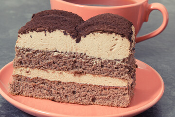 Tasty creamy tiramisu cake and black coffee for different occasions. Delicious dessert
