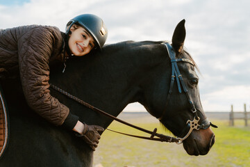 Jockey woman riding her horse during equestrian practice