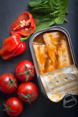 Sardine in a can. Boneless sardines in oil. Peppers, tomatoes, lemons. Dip. Sardine pate