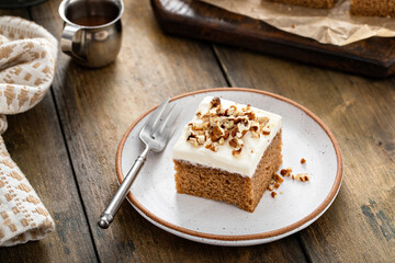 Carrot or pumpkin spiced cake with cream cheese frosting and pecan - Powered by Adobe