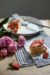strawberry cake serving and piones