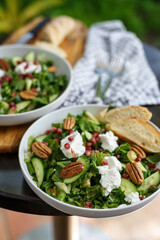salad with goat cheese pomegranate and  pecan