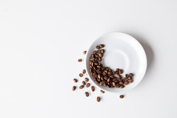 Fototapeta na wymiar coffee bean on white table background. top view. space for text