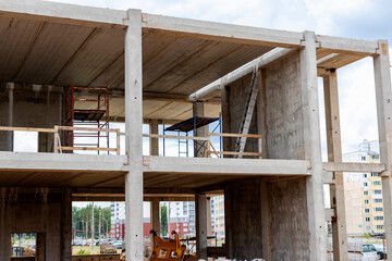 Construction of a reinforced concrete building. Elements of a concrete house. Structural elements. Construction site. Foundations and grillages.