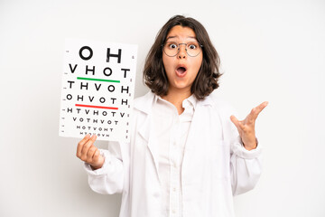 hispanic pretty girl feeling sad and whiney with an unhappy look and crying. optical vision test...