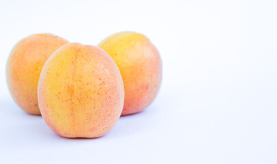 Apricot fruits isolated on white background.