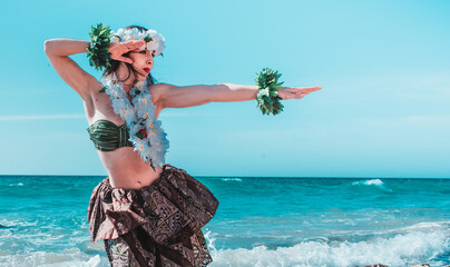 Hula dancer performing hawaii dance. Girl dancing wearing tahiti summer clothes. Miss queen flower...