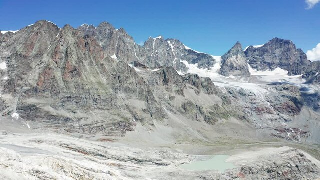 Aerial 4K, view of the Bernina Group from the Scerscen Refuge in Valmalenco, Italy, July 2022
