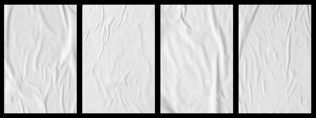 white crumpled and creased glued paper poster set isolated on black background - obrazy, fototapety, plakaty
