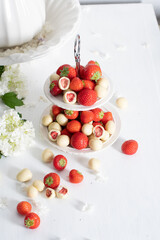  white chocolate covered strawberries, fresh strawberries and white floweers
