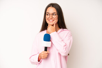 hispanic pretty woma feeling sad, upset or angry and looking to the side. journalist with a...