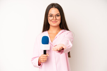 hispanic pretty woma amazed, shocked and astonished with an unbelievable surprise. journalist with...