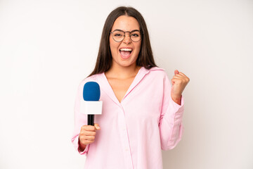 hispanic pretty woma on profile view thinking, imagining or daydreaming. journalist with a...