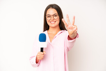 hispanic pretty woma screaming with hands up in the air. journalist with a microphone
